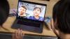 Children in a videocall, through a laptop